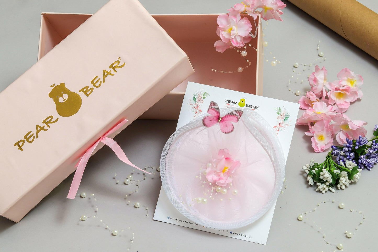 Pear Bear Flower & Butterfly Embellished Twisted Peach Hair Fascinator.