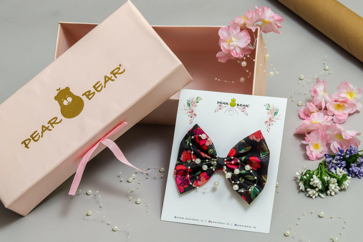 Pear Bear Flowery printed with pearl string bow.