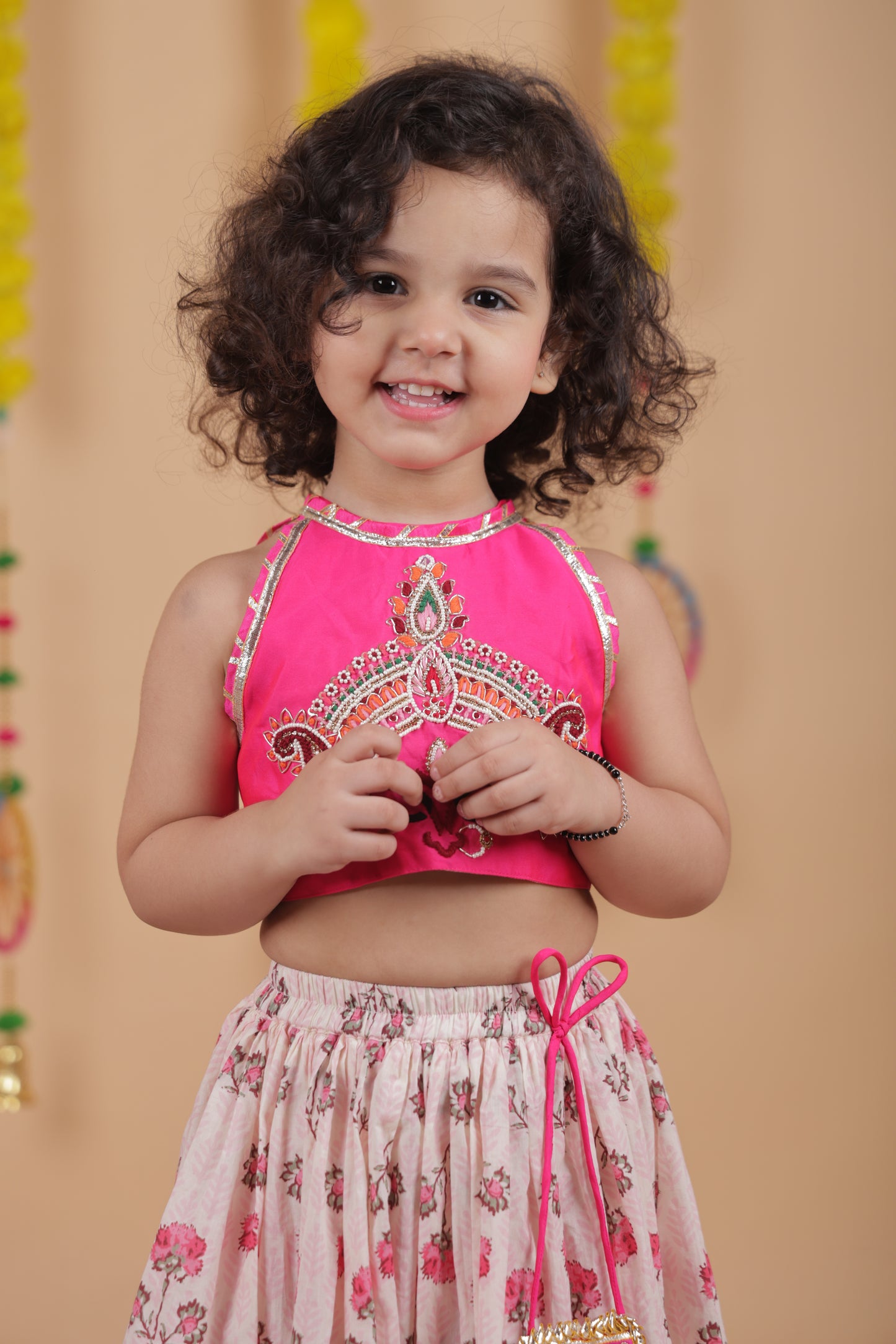Pear Bear Goddess Embroidered Pink Top And Beautiful Tassels Embellished Lehenga With Matching Sling Bag