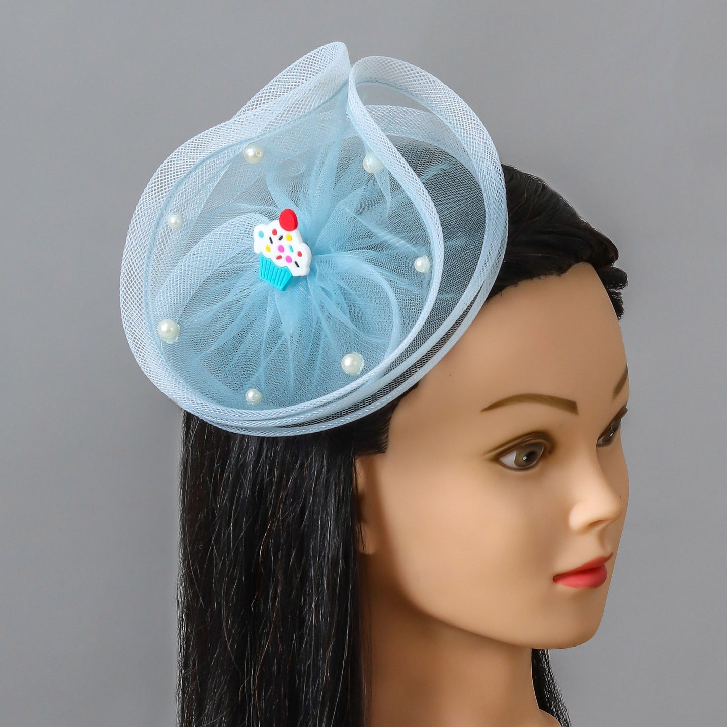 Pretty blue cupcake twisted fascinator