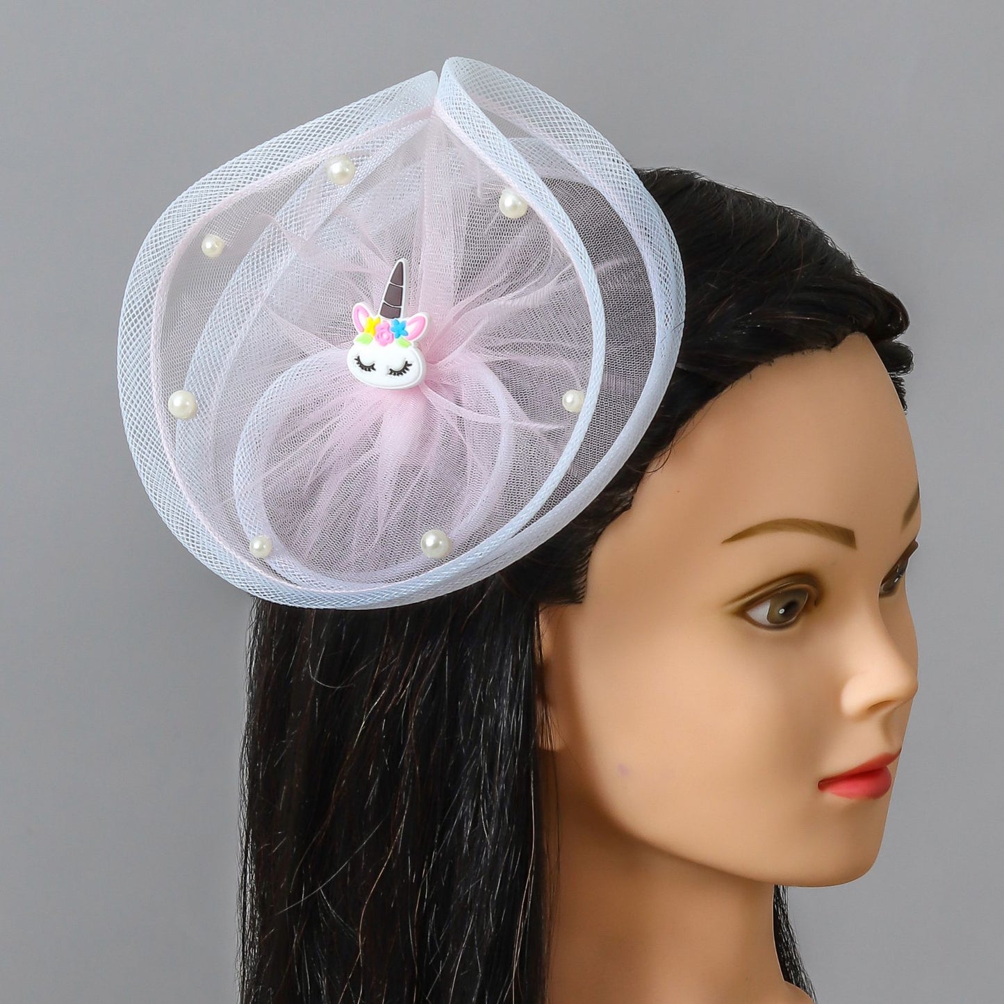 Pretty pink Unicorn twisted fascinator