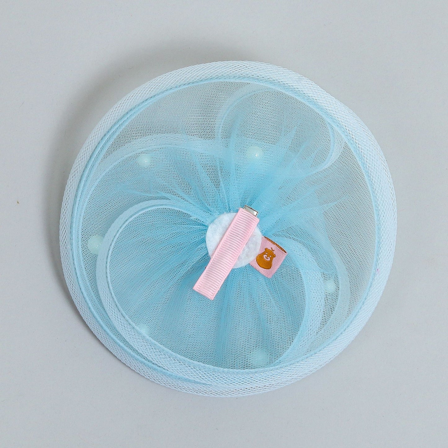 Pretty blue cupcake twisted fascinator