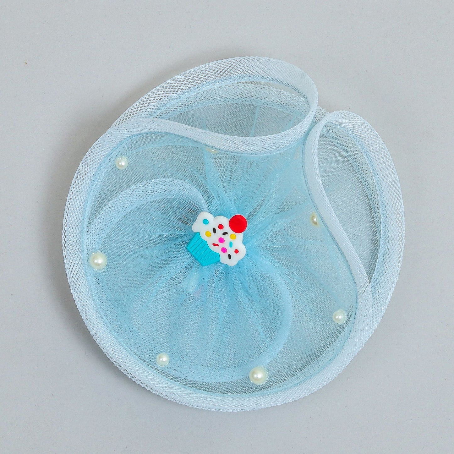 Pretty blue cupcake twisted fascinator