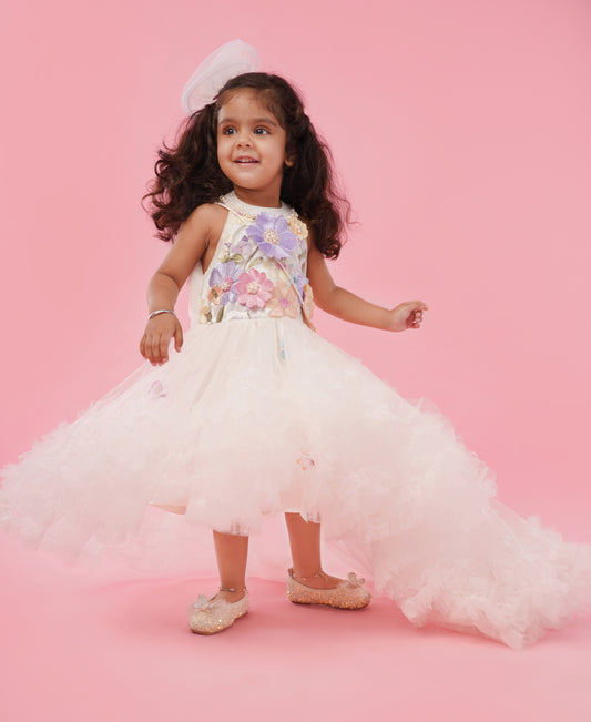 Ivory floral appliqué high-low party gown for girls with layered flare and couture detailing