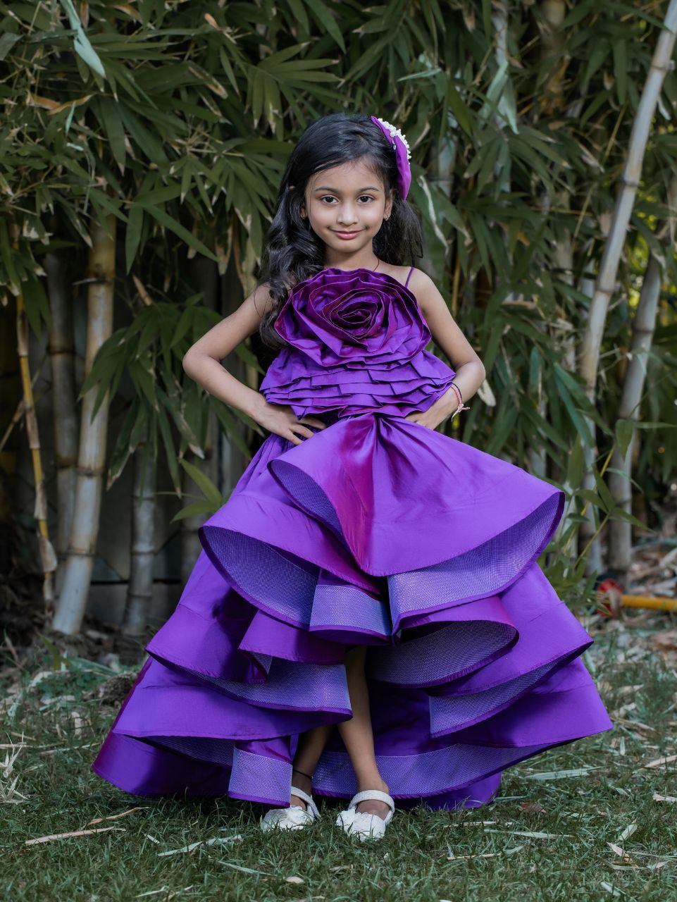 Purple rose couture high-low party gown for girls with statement floral bodice and layered trail