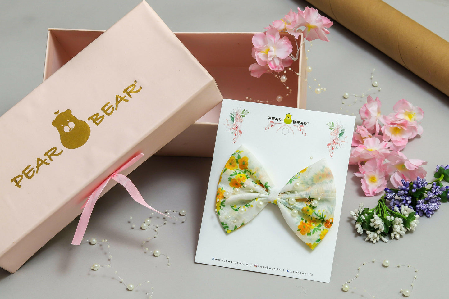 Pear Bear Beautiful flower print bow with pearl strings.