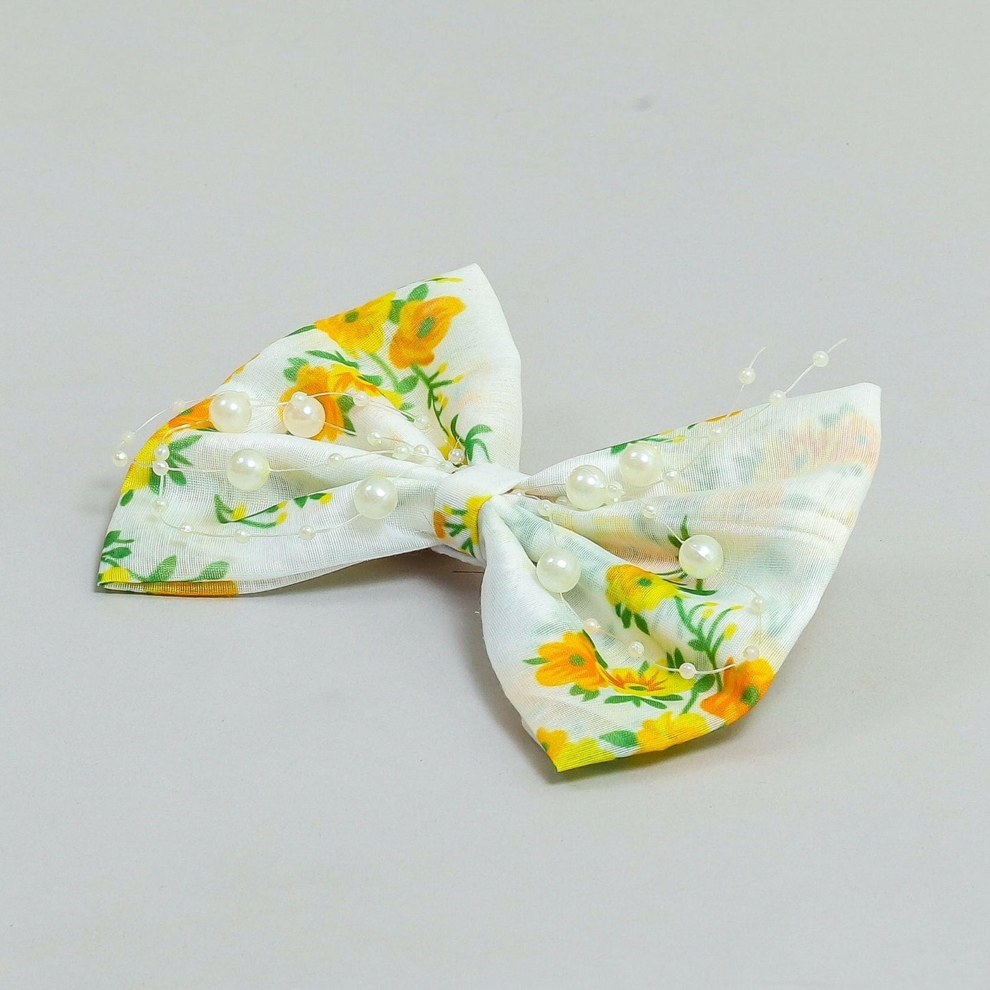 Pear Bear Beautiful flower print bow with pearl strings.