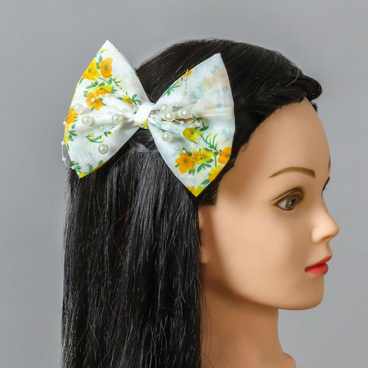 Pear Bear Beautiful flower print bow with pearl strings.