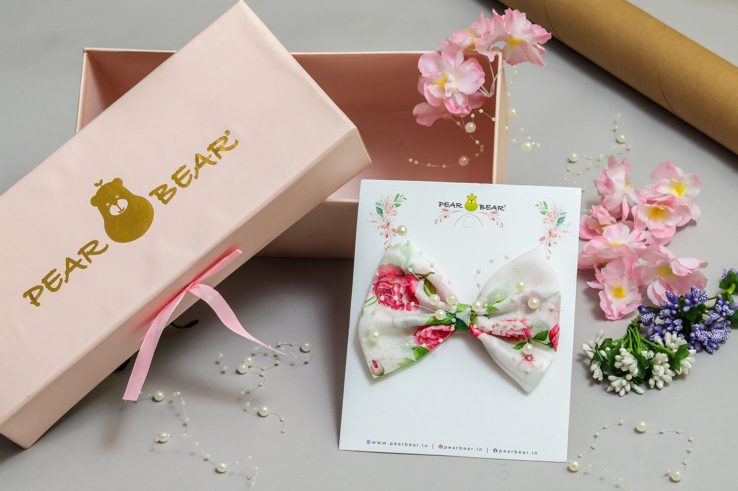 Pear Bear Beautiful flower print bowie with pearl strings.