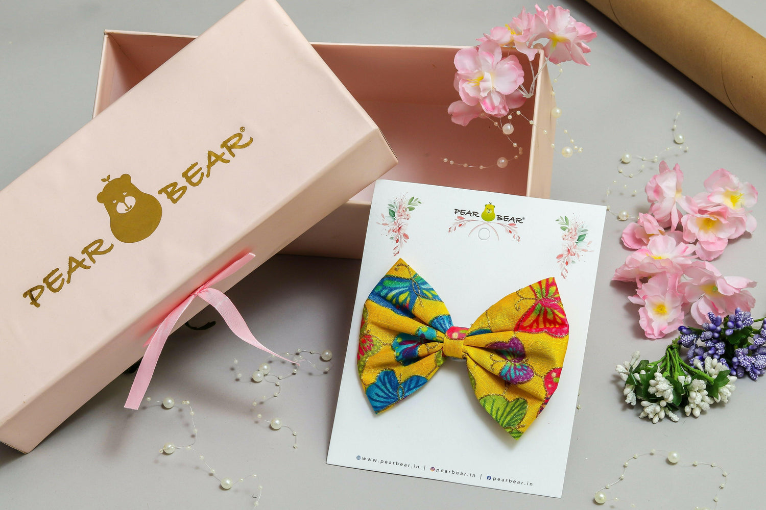 Pear Bear Beautiful hair bow with multi colour butterfly print.