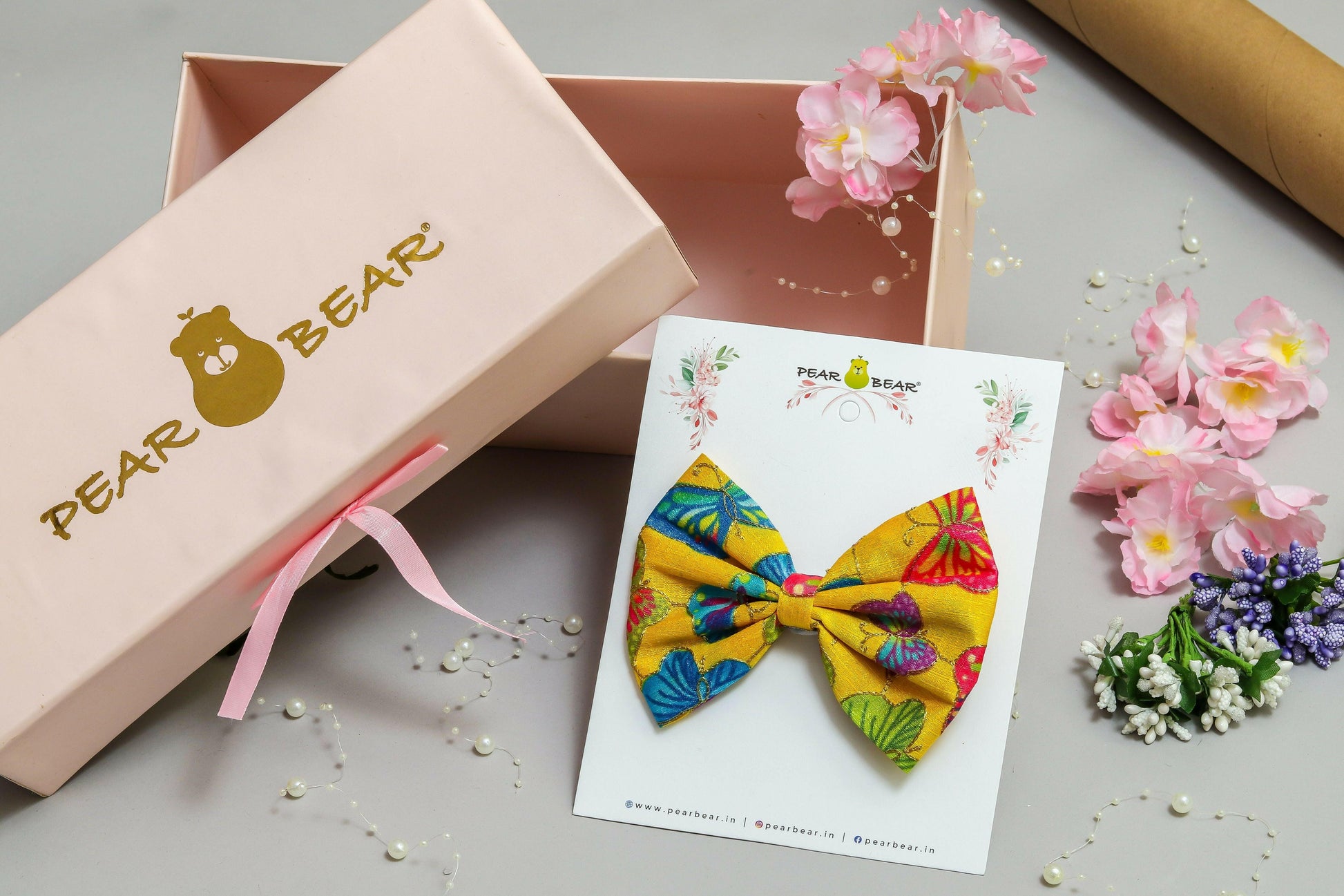 Pear Bear Beautiful hair bow with multi colour butterfly print.