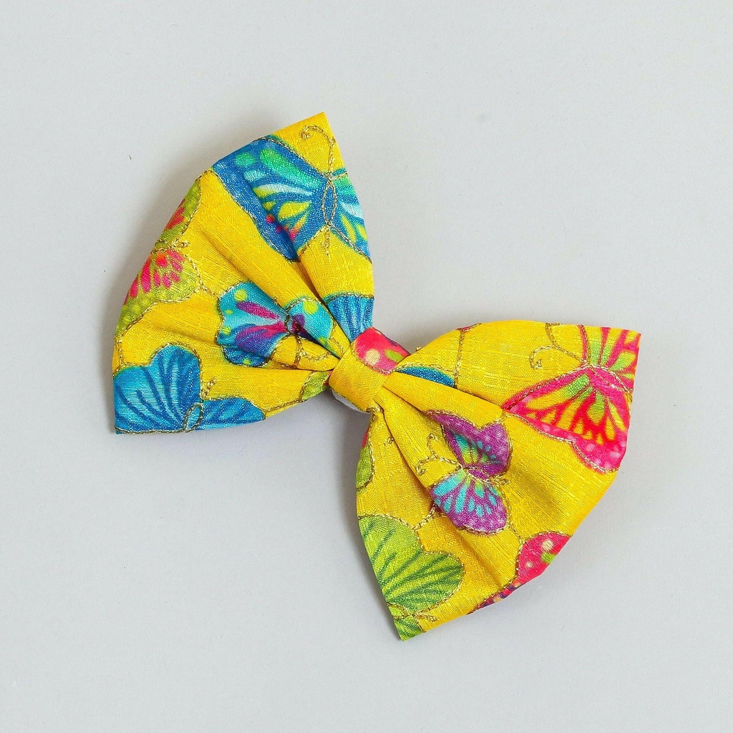 Pear Bear Beautiful hair bow with multi colour butterfly print.