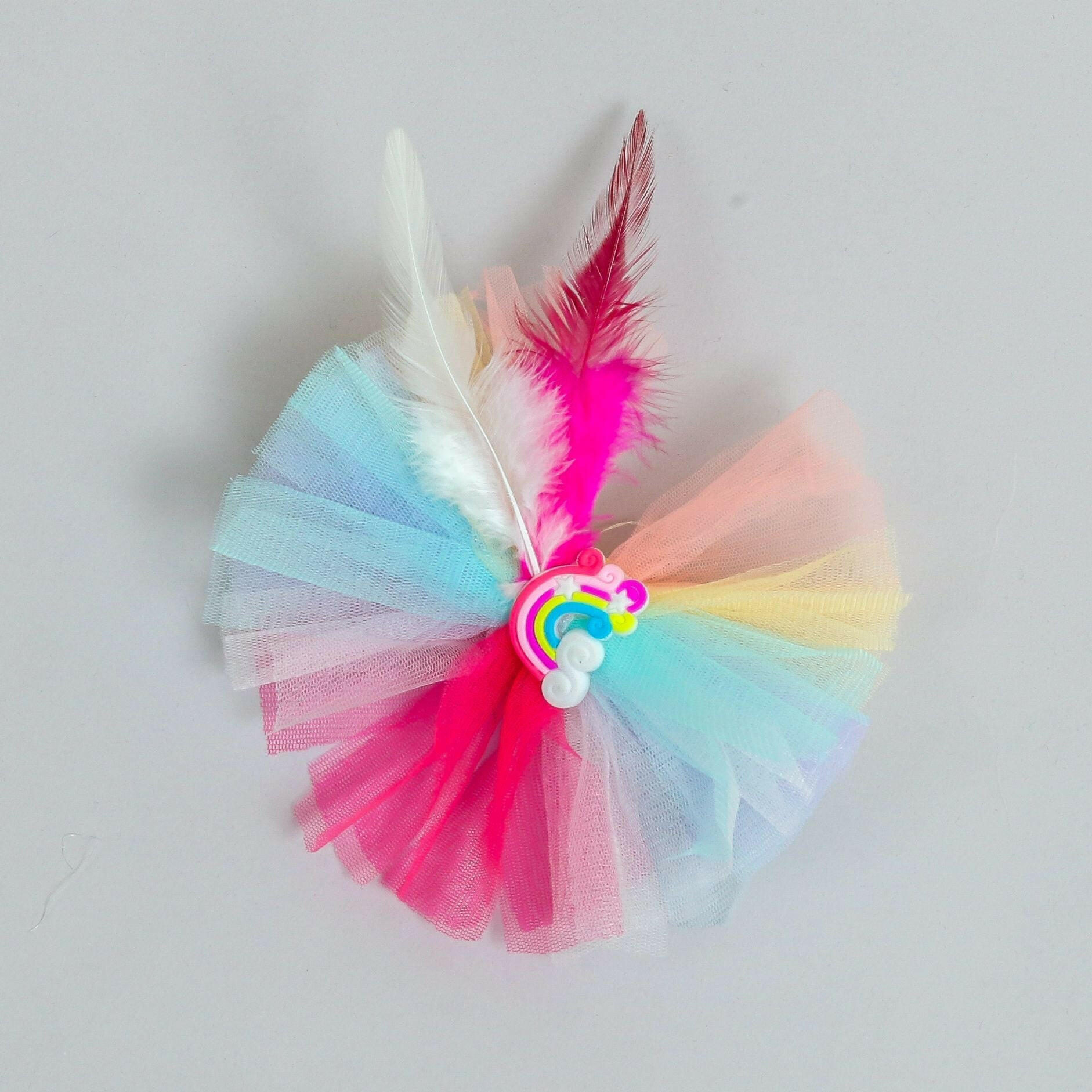 Pear Bear Beautiful rainbow adorned frilly hair clip.