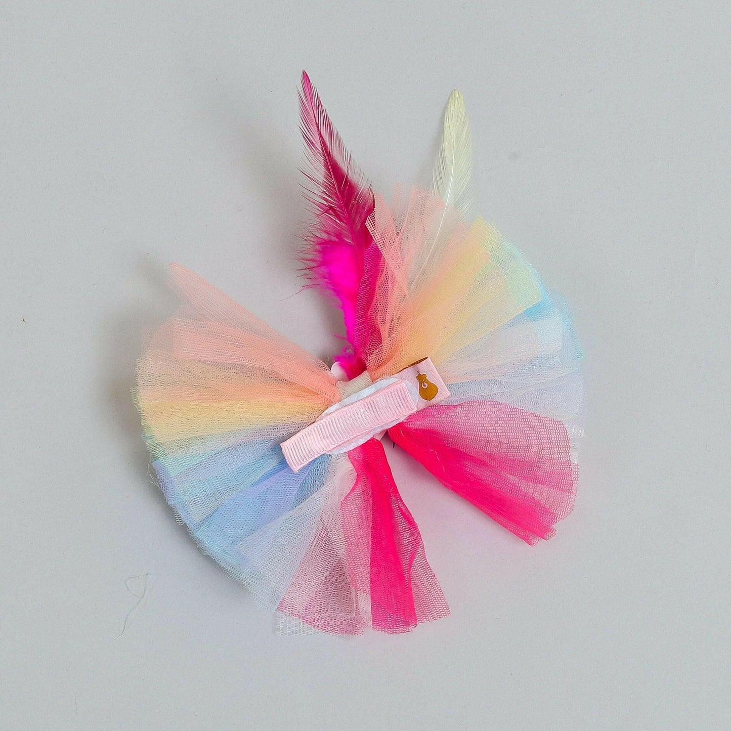 Pear Bear Beautiful rainbow adorned frilly hair clip.