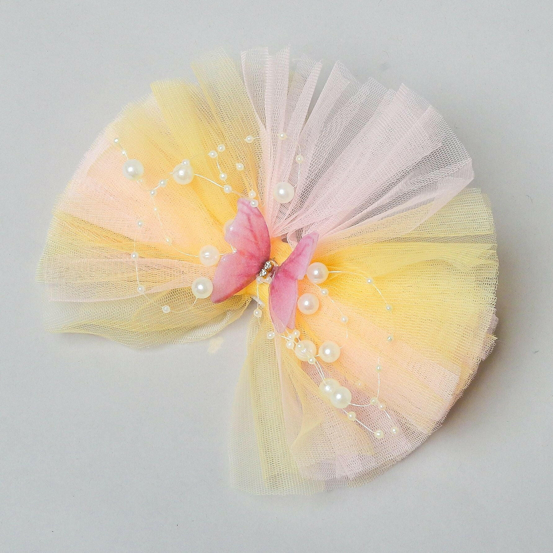 Pear Bear Butterfly Adorned Yellow And Pink Two Tone Frilly Hair Clip.