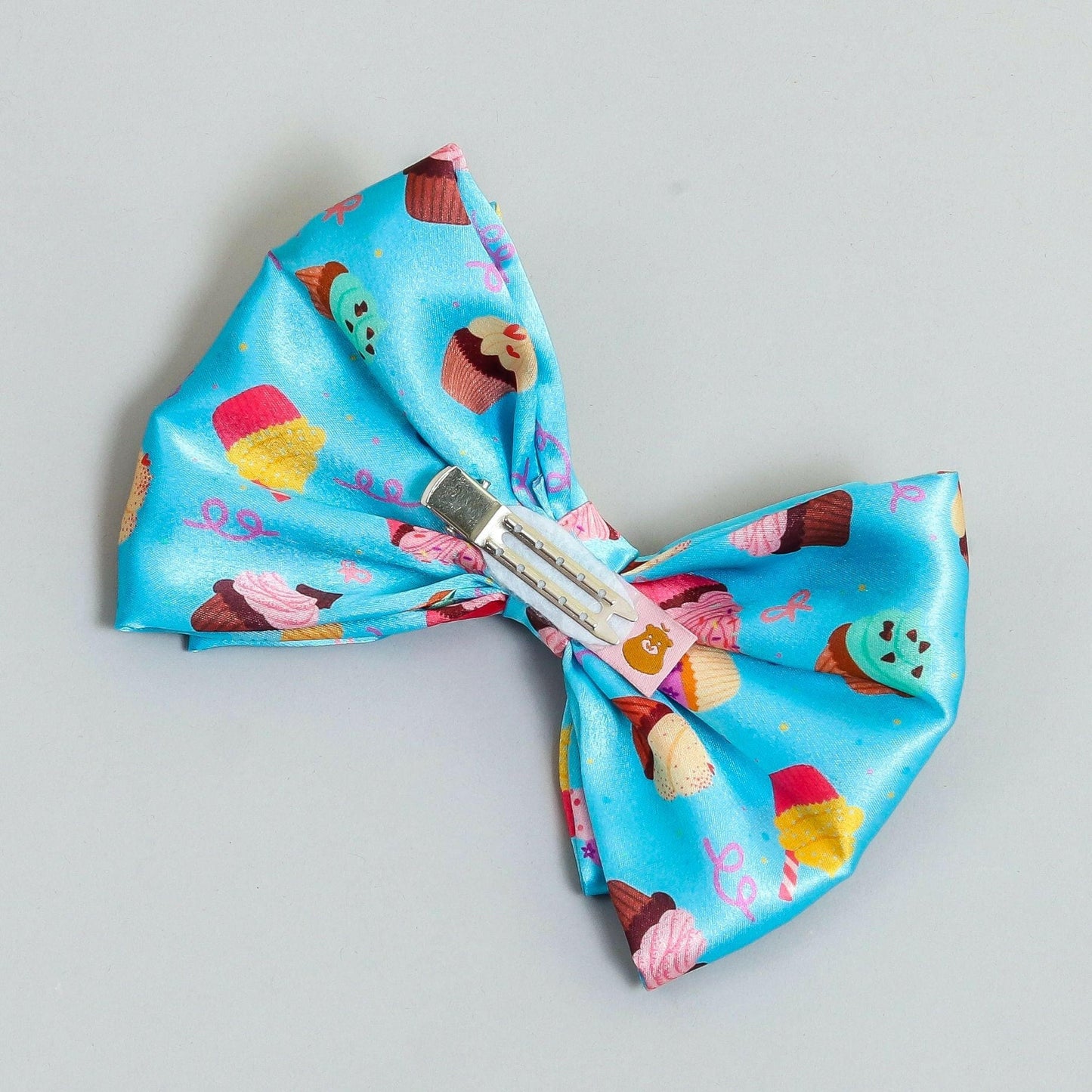 Pear Bear Dual bow with cupcake print bow.