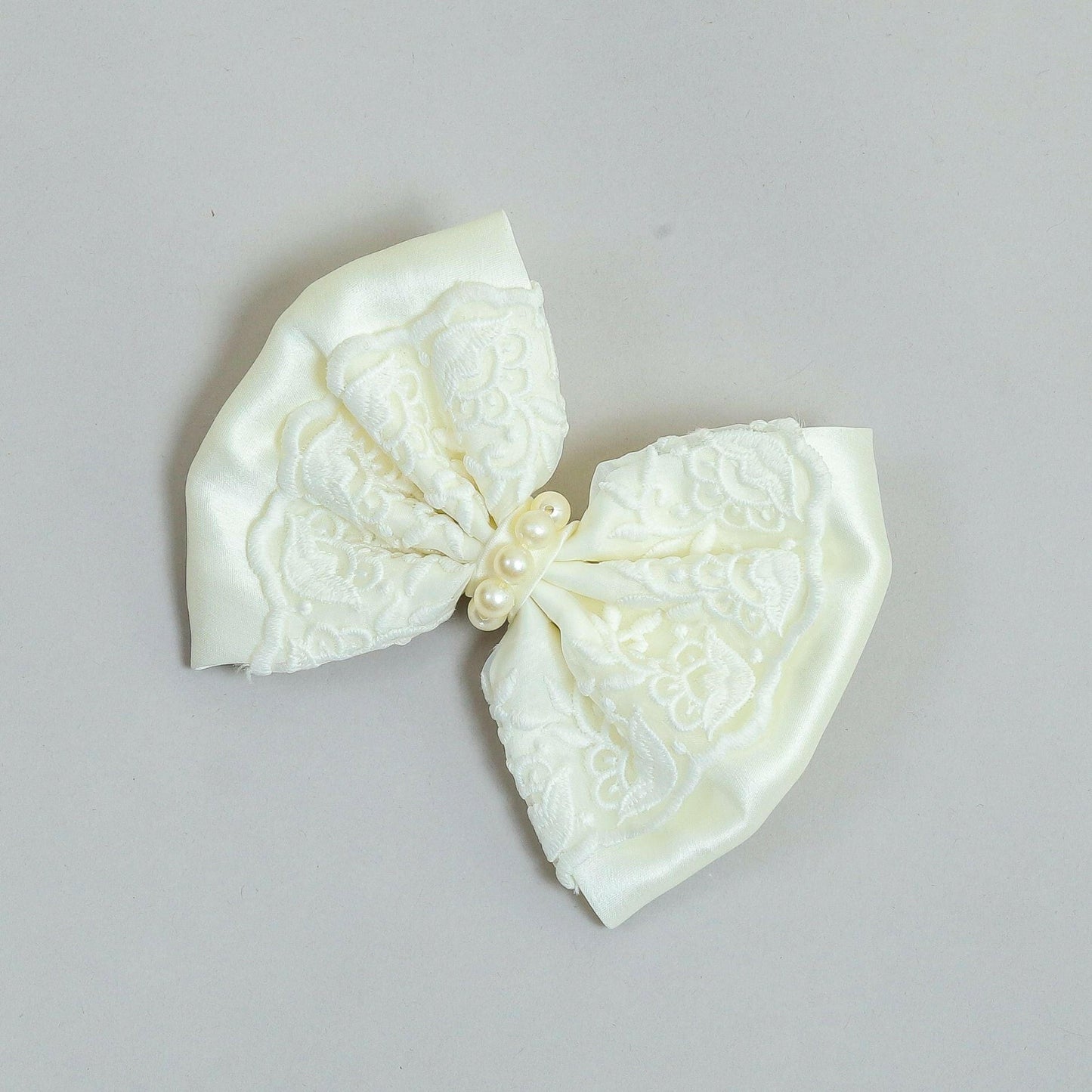 Pear Bear Elegant off white embroidered bow.
