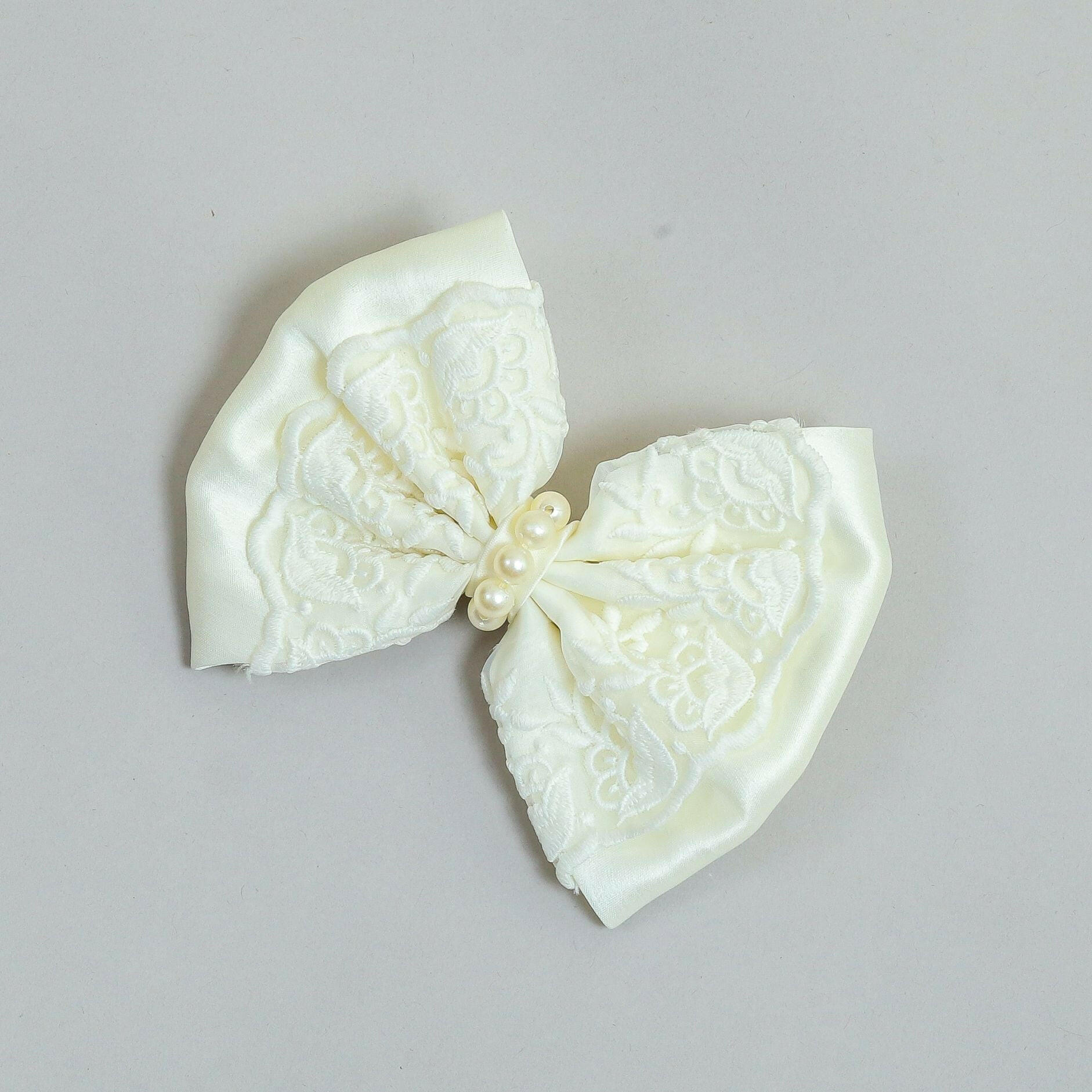 Pear Bear Elegant off white embroidered bow.