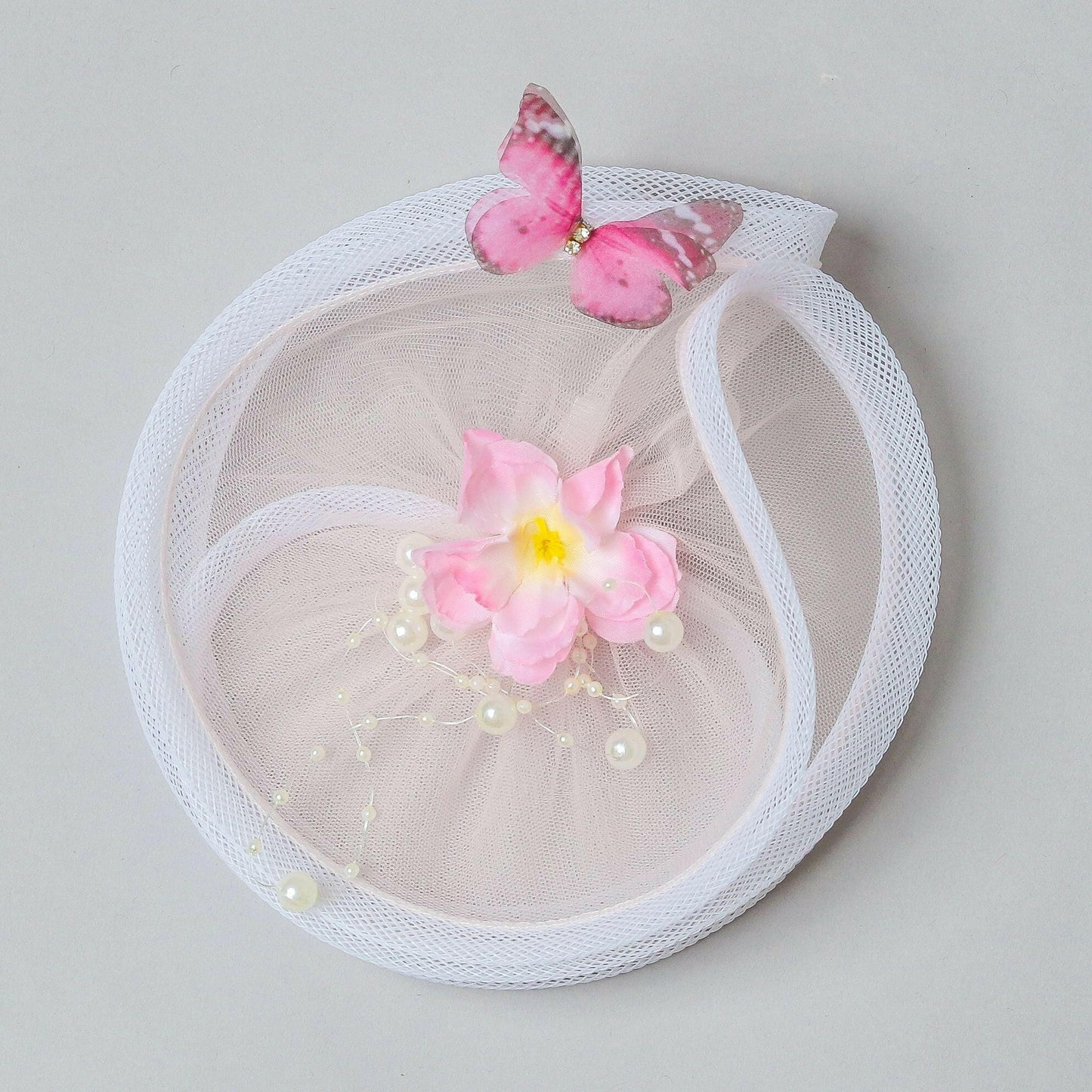 Pear Bear Flower & Butterfly Embellished Twisted Peach Hair Fascinator.