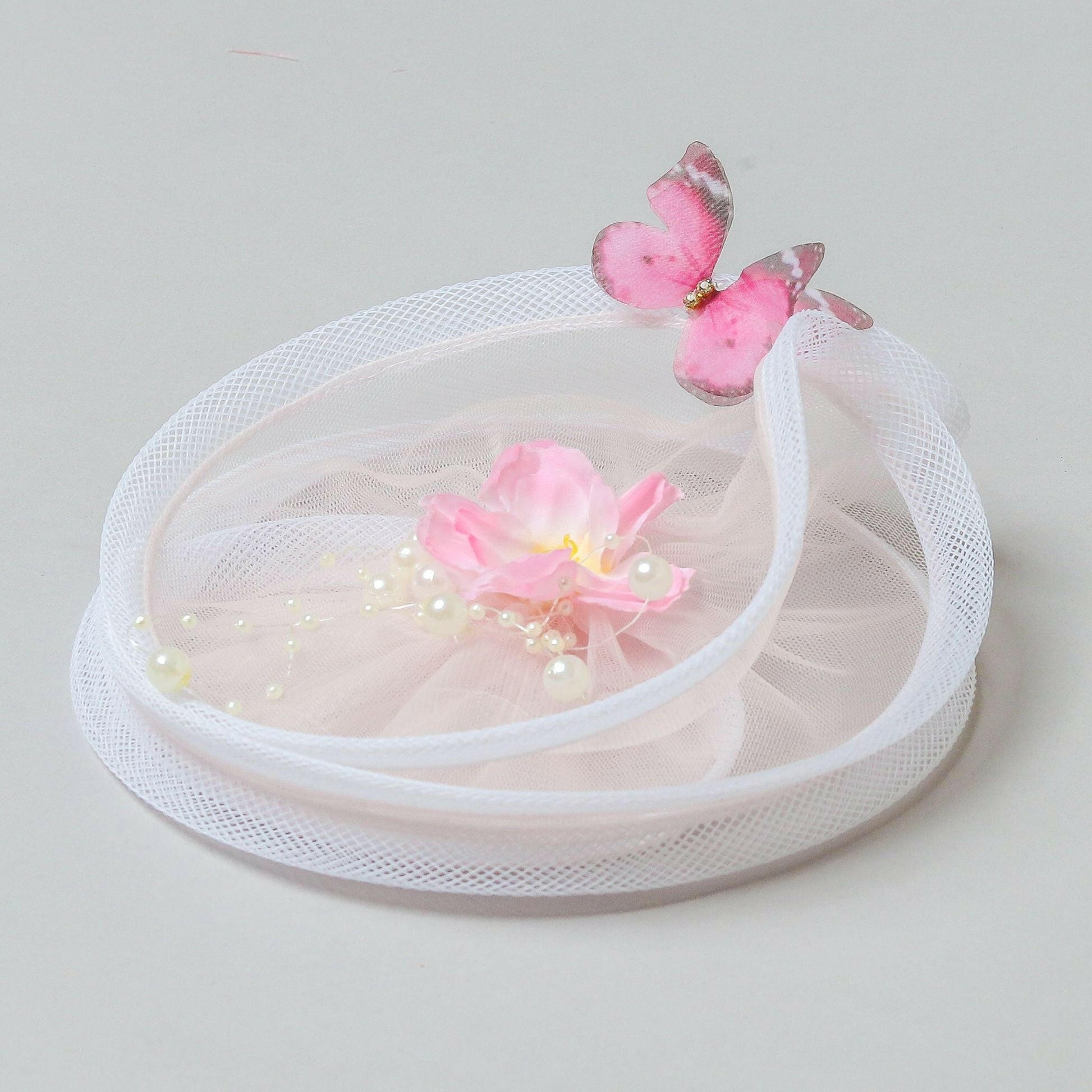 Pear Bear Flower & Butterfly Embellished Twisted Peach Hair Fascinator.