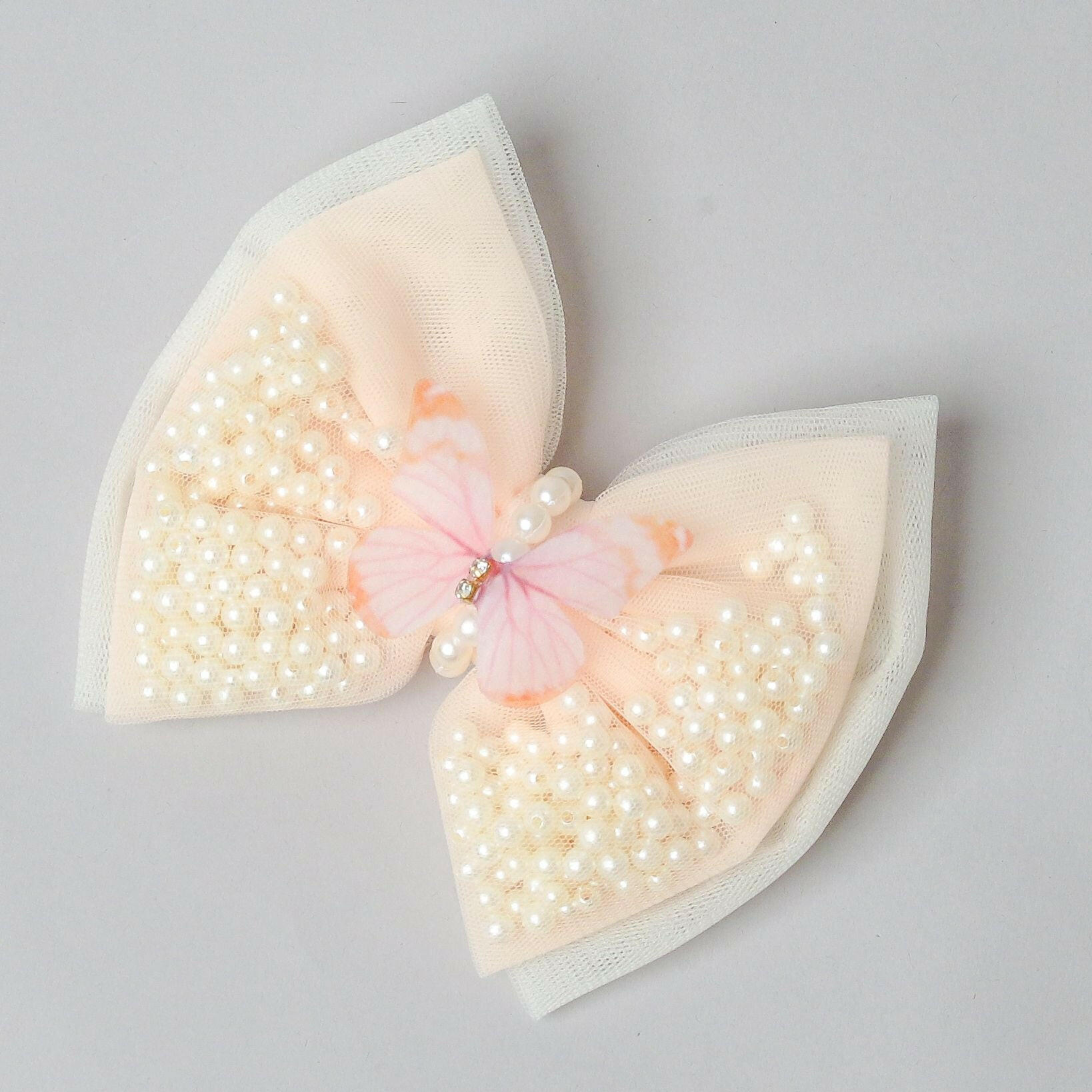Pear Bear Peach And Off White Dual Bow Hair clip.