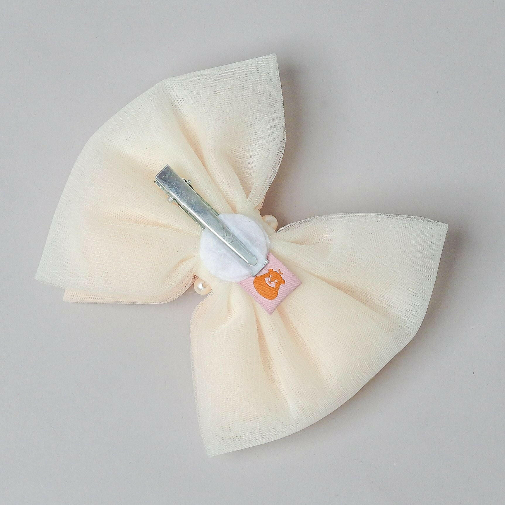 Pear Bear Peach And Off White Dual Bow Hair clip.