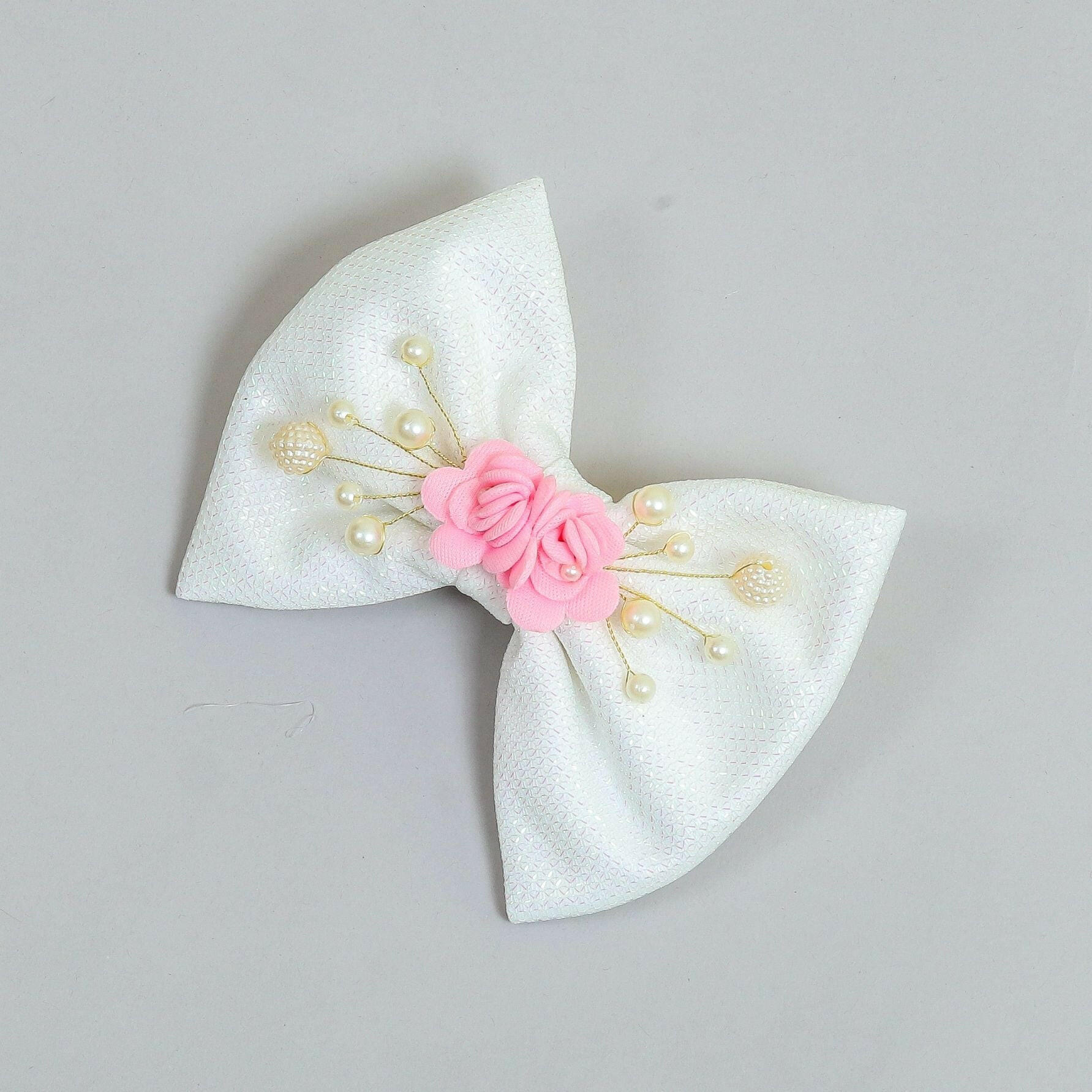 Pear Bear Shimmery flower and pearl adorned bow.
