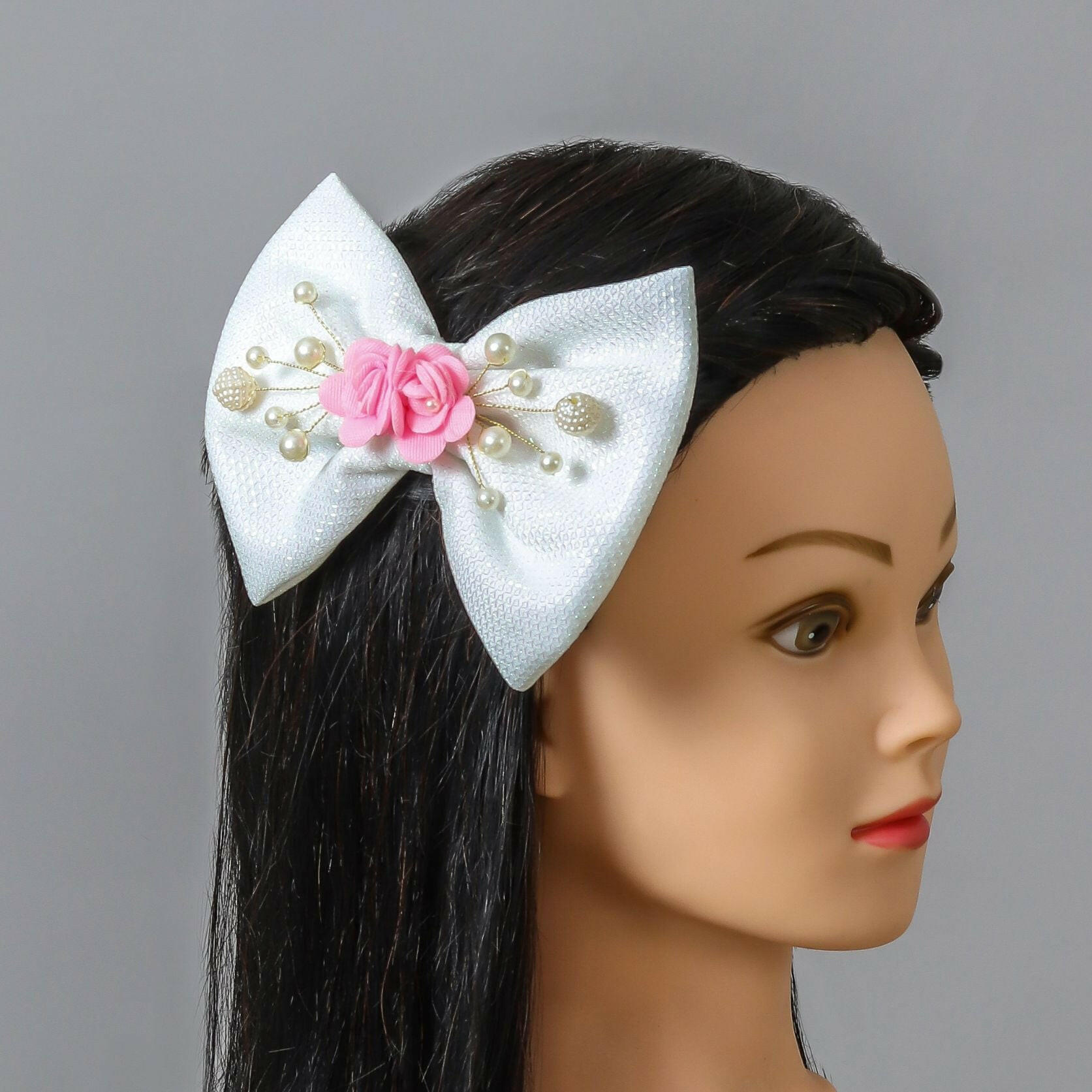 Pear Bear Shimmery flower and pearl adorned bow.