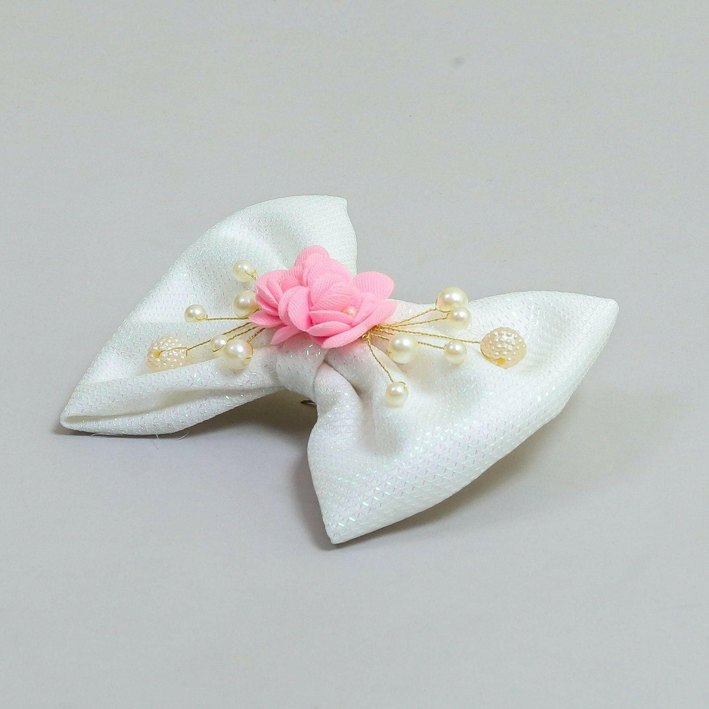 Pear Bear Shimmery flower and pearl adorned bow.