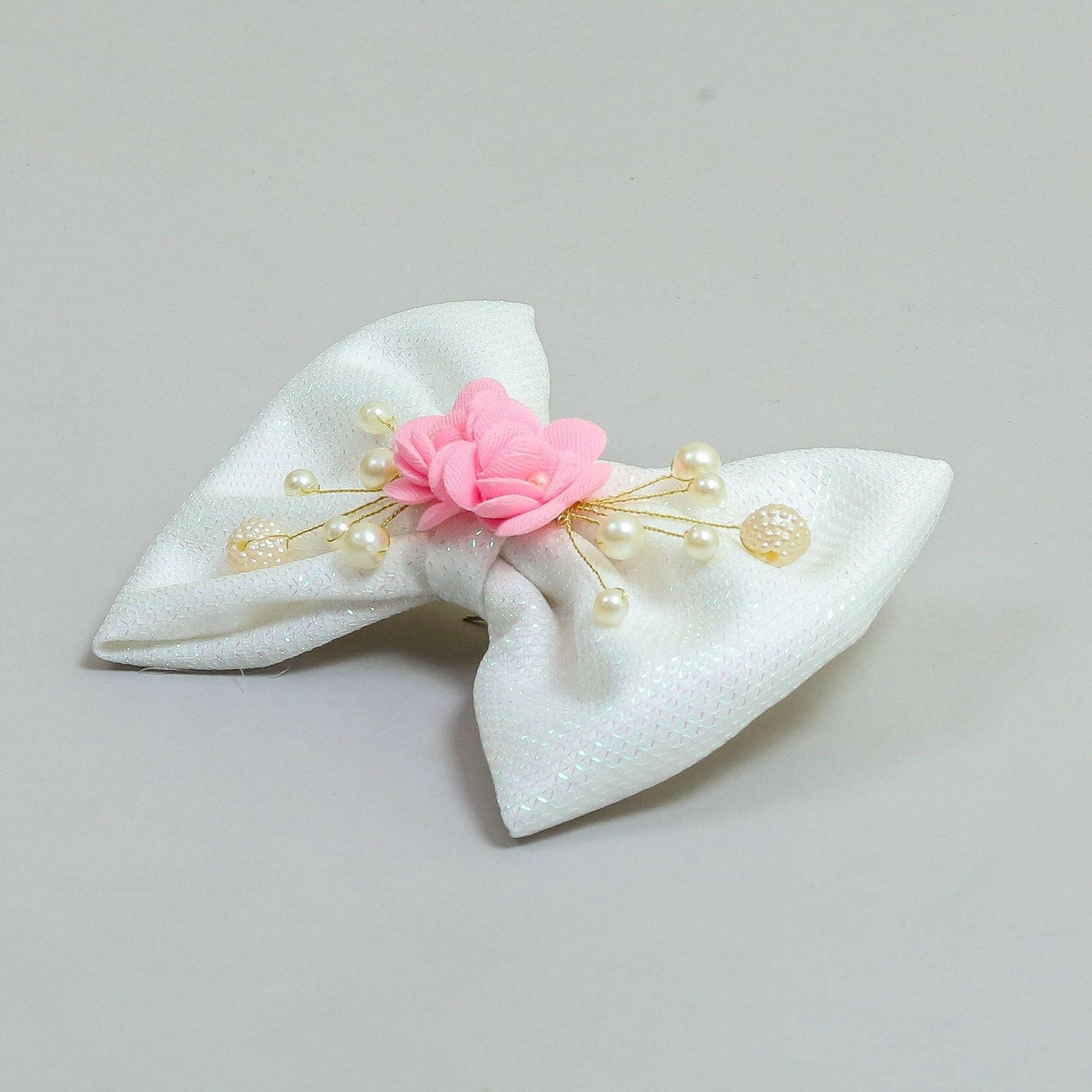Pear Bear Shimmery flower and pearl adorned bow.