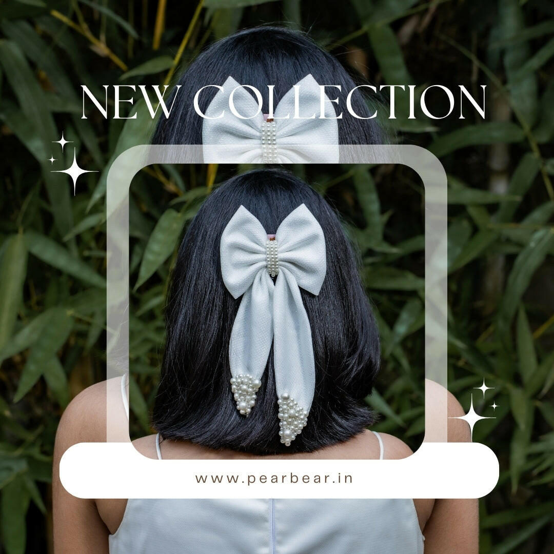 Pear Bear Shimmery pearl adorned beautiful pigtail bow.